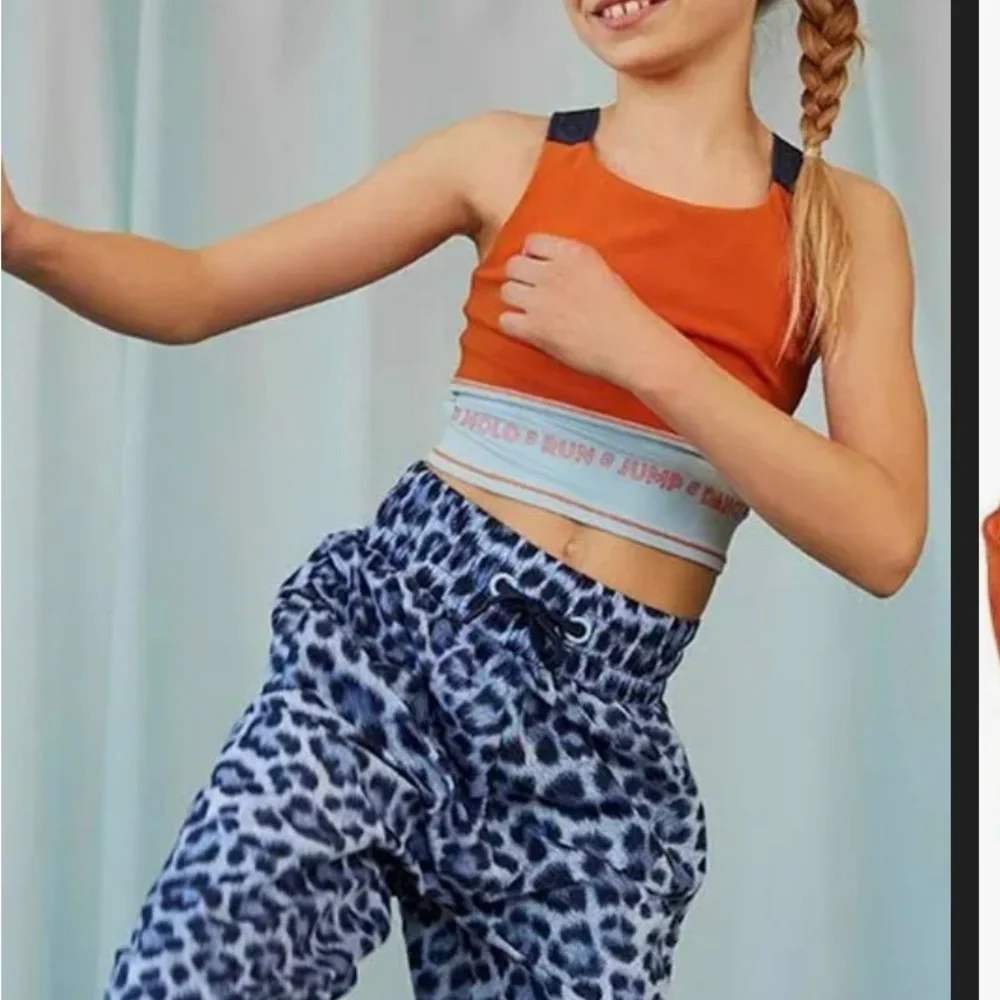 Molo Orange and Blue Kids Sports Top euro 170/176